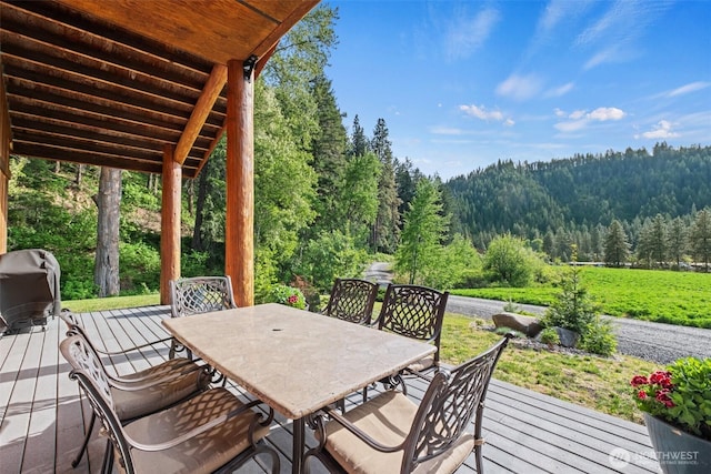 111 Connon Canyon Rd, Leavenworth, WA 98826 - deck with a view of trees and outdoor dining space
