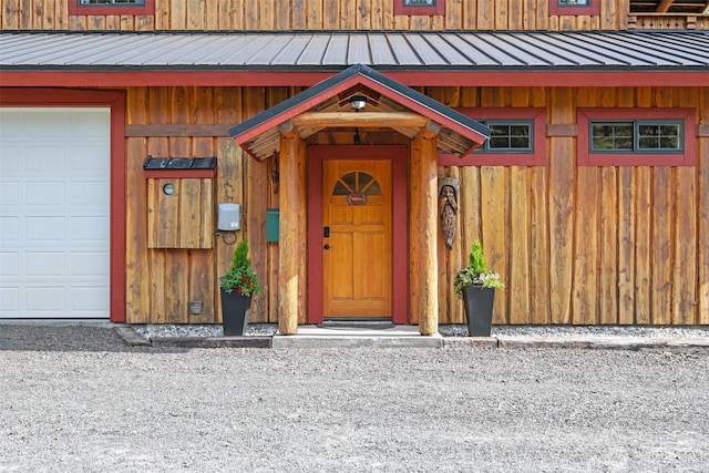 111 Connon Canyon Rd, Leavenworth, WA 98826 - property entrance featuring metal roof and a garage