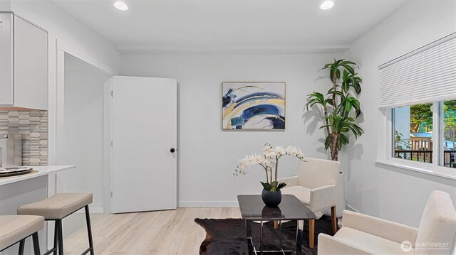 911 Hiawatha Pl S, Seattle, WA 98144 - living area with light wood-style flooring and recessed lighting