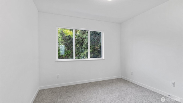 911 Hiawatha Pl S, Seattle, WA 98144 - spare room with carpet and baseboards