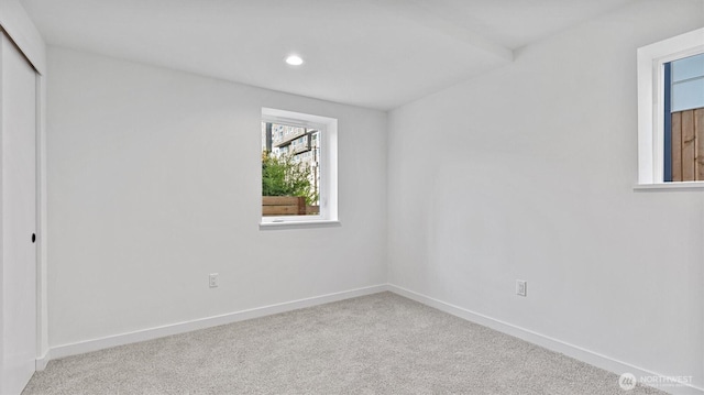 911 Hiawatha Pl S, Seattle, WA 98144 - unfurnished bedroom with carpet floors, recessed lighting, a closet, and baseboards
