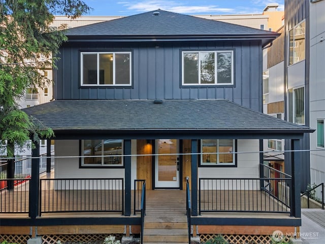 911 Hiawatha Pl S, Seattle, WA 98144 - back of house with roof with shingles and board and batten siding
