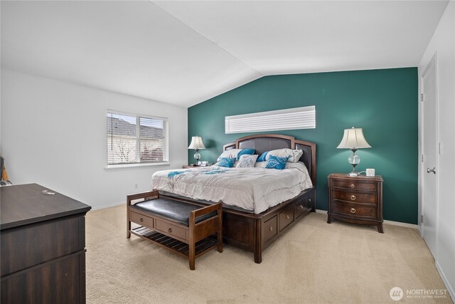 14627 81st Ave E, Puyallup, WA 98375 - bedroom with vaulted ceiling, light colored carpet, and baseboards