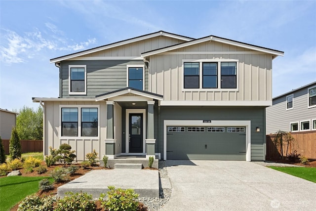 13436 NE 105th Ct Unit 17, Kirkland, WA 98033 - view of front facade with board and batten siding, driveway, and a garage