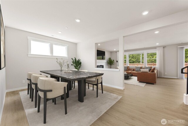 13436 NE 105th Ct Unit 17, Kirkland, WA 98033 - dining space featuring recessed lighting, light wood finished floors, and baseboards