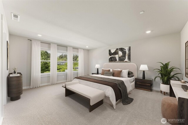 13436 NE 105th Ct Unit 17, Kirkland, WA 98033 - bedroom featuring recessed lighting, light colored carpet, and baseboards