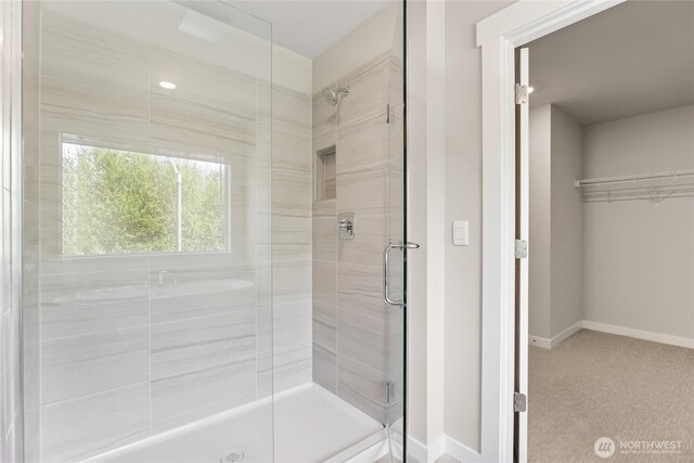 13436 NE 105th Ct Unit 17, Kirkland, WA 98033 - full bathroom with a shower stall and baseboards