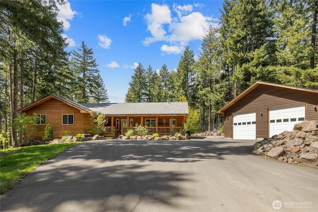 201 Double O Rd, Ronald, WA 98940 - view of front of property featuring asphalt driveway, a garage, and a porch