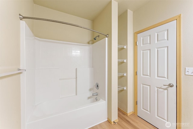 10109 186th St E Unit 249, Puyallup, WA 98371 - full bathroom featuring wood finished floors and bathtub / shower combination