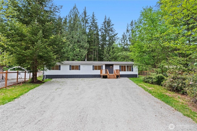 1071 Red Valley Ln, Maple Falls, WA 98266 - manufactured / mobile home featuring gravel driveway and fence