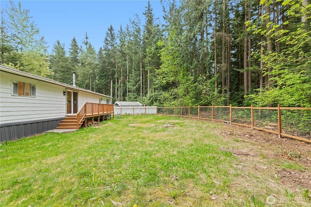 1071 Red Valley Ln, Maple Falls, WA 98266 - view of yard with a wooden deck and a wooded view