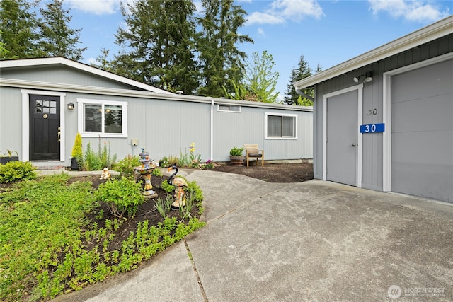 entrance to property with a patio