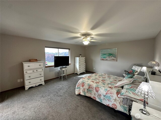 bedroom featuring carpet floors, ceiling fan, and baseboards