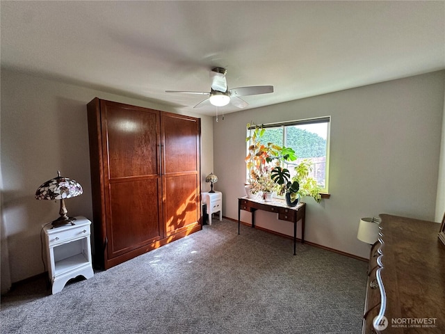 carpeted bedroom featuring a ceiling fan