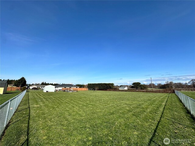 view of yard featuring a view of countryside
