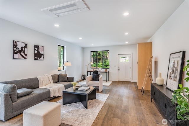 22513 Clearland Ln SE, Yelm, WA 98597 - living area featuring recessed lighting, wood finished floors, and baseboards