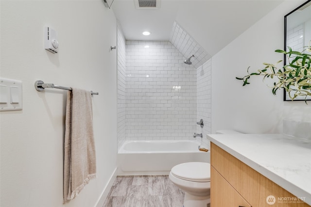 22513 Clearland Ln SE, Yelm, WA 98597 - full bath featuring toilet, tub / shower combination, vanity, baseboards, and marble finish floors