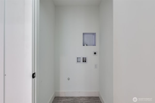 22513 Clearland Ln SE, Yelm, WA 98597 - clothes washing area with electric dryer hookup, washer hookup, baseboards, and gas dryer hookup