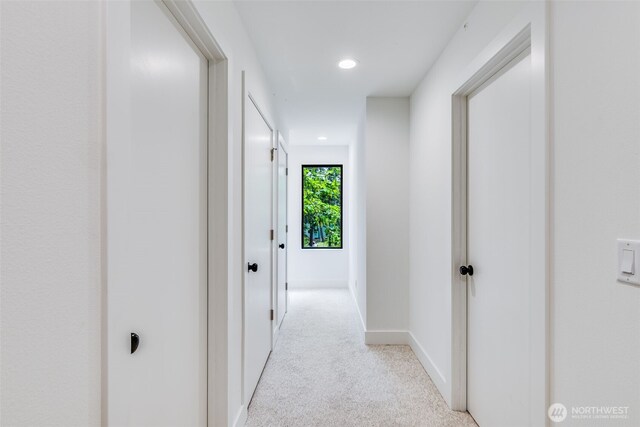 22513 Clearland Ln SE, Yelm, WA 98597 - hall featuring light colored carpet, recessed lighting, and baseboards