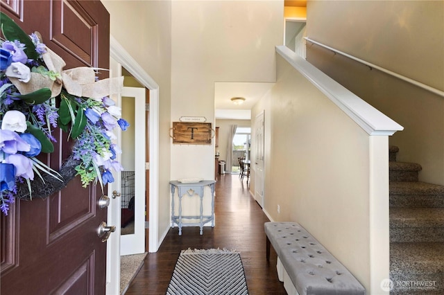 19424 E 26th Avenue Ct E, Spanaway, WA 98387 - entrance foyer with stairway, dark wood finished floors, a towering ceiling, and baseboards