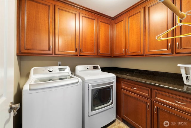 19424 E 26th Avenue Ct E, Spanaway, WA 98387 - laundry area with cabinet space and washing machine and dryer