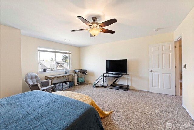 19424 E 26th Avenue Ct E, Spanaway, WA 98387 - carpeted bedroom featuring a ceiling fan and baseboards