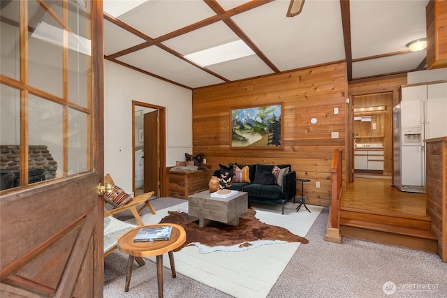 15790 Agatewood Rd NE, Bainbridge Island, WA 98110 - living area featuring wooden walls and light colored carpet