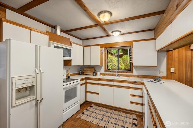 15790 Agatewood Rd NE, Bainbridge Island, WA 98110 - kitchen with white appliances, a sink, light countertops, and white cabinets
