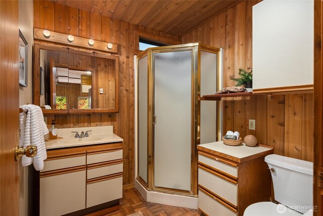 15790 Agatewood Rd NE, Bainbridge Island, WA 98110 - full bathroom with wood walls, a stall shower, wood ceiling, toilet, and vanity