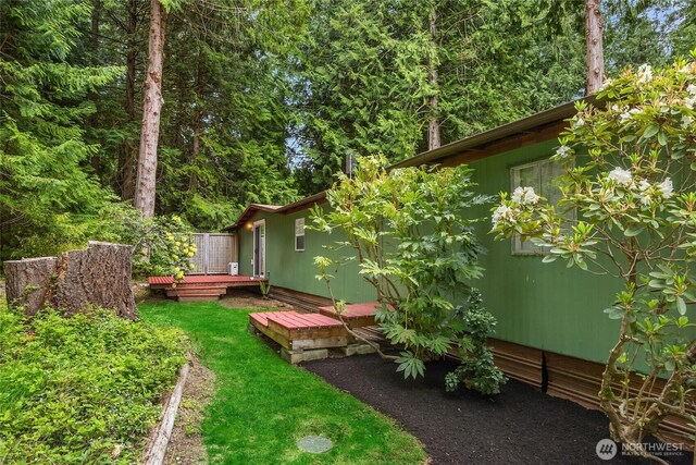 15790 Agatewood Rd NE, Bainbridge Island, WA 98110 - view of yard with a deck