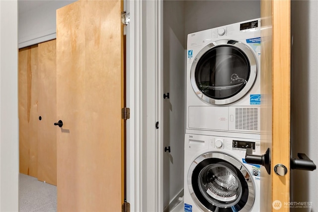 2273 14th Ave W, Seattle, WA 98119 - clothes washing area with stacked washing machine and dryer