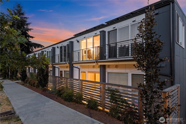 2273 14th Ave W, Seattle, WA 98119 - view of front facade with a balcony and fence