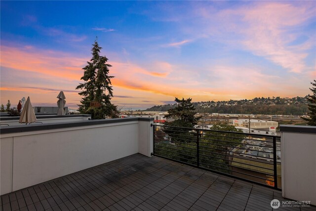 2273 14th Ave W, Seattle, WA 98119 - patio terrace at dusk with a balcony