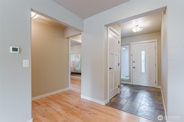8070 Kispiox Rd, Blaine, WA 98230 - entryway featuring baseboards and wood finished floors