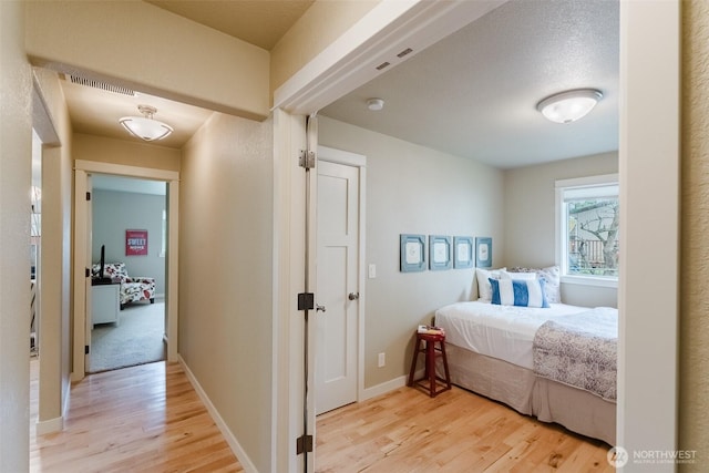 8070 Kispiox Rd, Blaine, WA 98230 - bedroom featuring light wood-style floors and baseboards