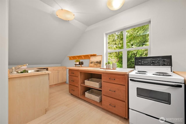 9591 W 34th Cres, Blaine, WA 98230 - kitchen featuring white electric range oven, a sink, wooden counters, light wood-style floors, and lofted ceiling