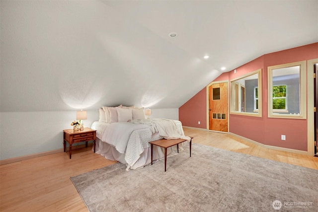9591 W 34th Cres, Blaine, WA 98230 - bedroom with light wood finished floors, baseboards, vaulted ceiling, and recessed lighting
