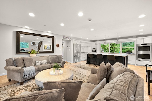 9591 W 34th Cres, Blaine, WA 98230 - living room with light wood-style flooring, recessed lighting, and baseboards
