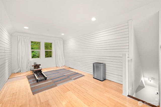 9591 W 34th Cres, Blaine, WA 98230 - exercise room featuring wood walls, wood finished floors, and recessed lighting