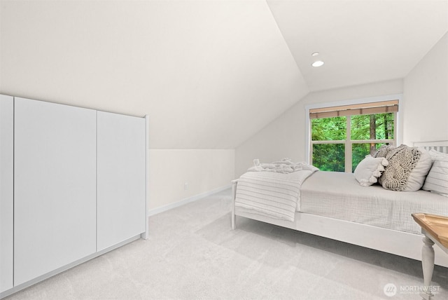 9591 W 34th Cres, Blaine, WA 98230 - bedroom featuring lofted ceiling, light carpet, recessed lighting, and baseboards