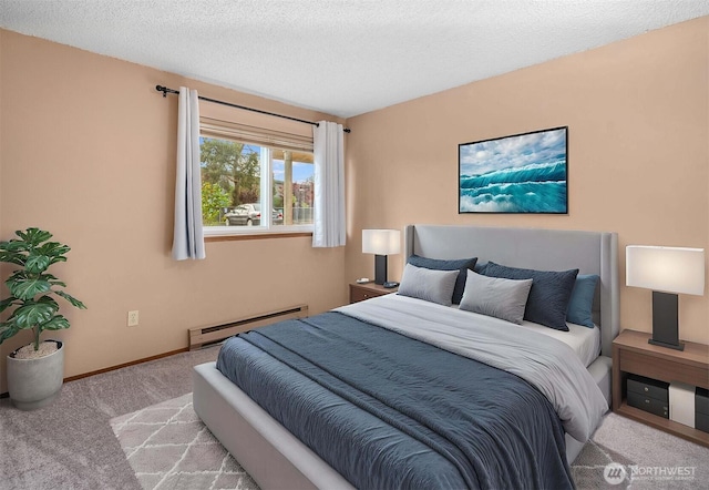 carpeted bedroom featuring a baseboard radiator, a textured ceiling, and baseboards