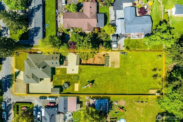 aerial perspective of suburban area featuring property boundaries highlighted