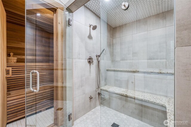 bathroom featuring a shower stall