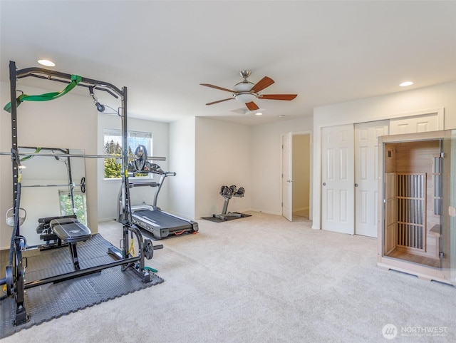 exercise room with a ceiling fan, recessed lighting, carpet floors, and baseboards