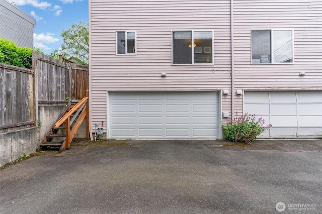 garage featuring fence