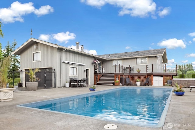 1835 E Smith Rd, Bellingham, WA 98226 - rear view of house featuring stairway, a deck, and a patio