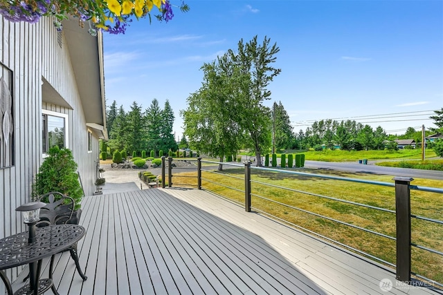 1835 E Smith Rd, Bellingham, WA 98226 - wooden terrace with a lawn and view of scattered trees