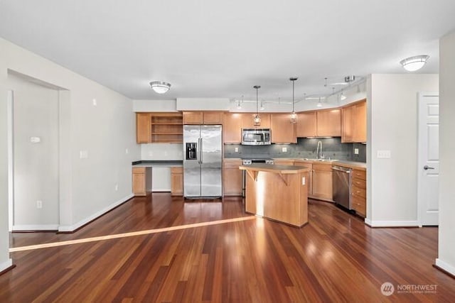 13426 97th Ave E Unit 204, Puyallup, WA 98373 - kitchen featuring stainless steel appliances, open shelves, dark wood-type flooring, decorative backsplash, and rail lighting