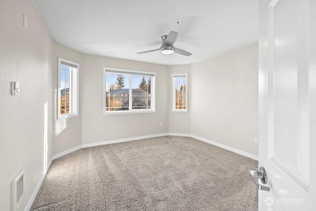13426 97th Ave E Unit 204, Puyallup, WA 98373 - unfurnished room featuring carpet floors, ceiling fan, and baseboards