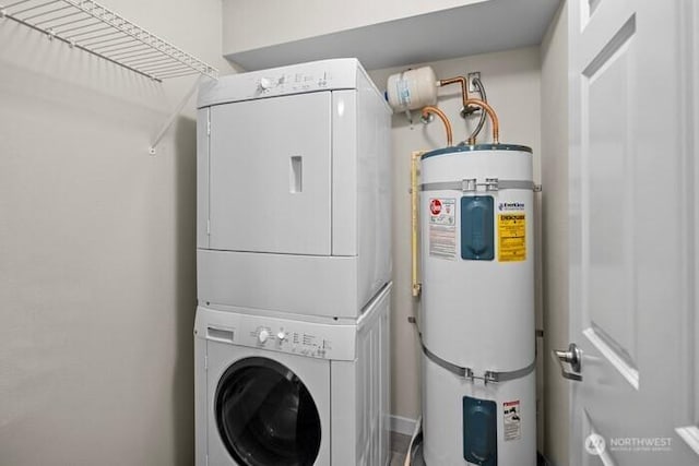 13426 97th Ave E Unit 204, Puyallup, WA 98373 - clothes washing area featuring stacked washing machine and dryer and electric water heater